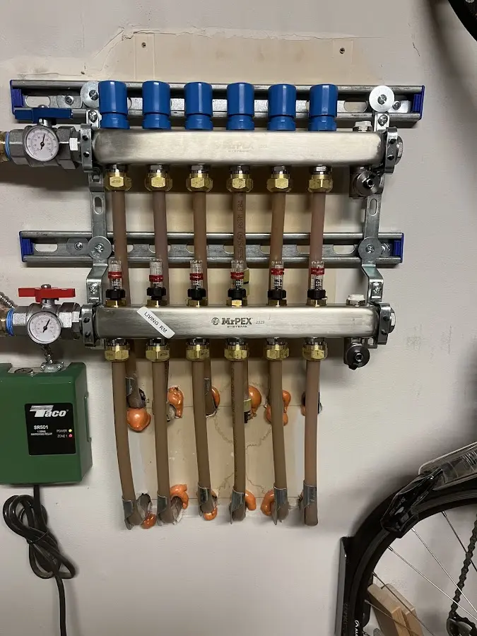 Plumber performing Water Heater Repair at a residential property in Manchester-by-the-Sea